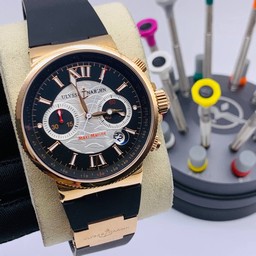 UN Maxi Marine Black/White Dial Gold Case on Black Rubber Strap